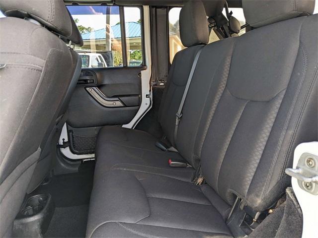 used 2014 Jeep Wrangler Unlimited car, priced at $14,399