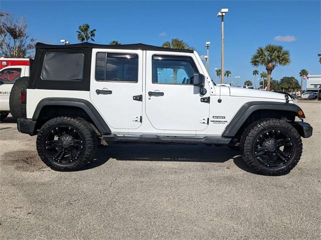 used 2014 Jeep Wrangler Unlimited car, priced at $14,399