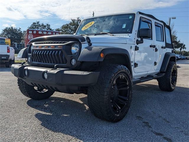 used 2014 Jeep Wrangler Unlimited car, priced at $14,399