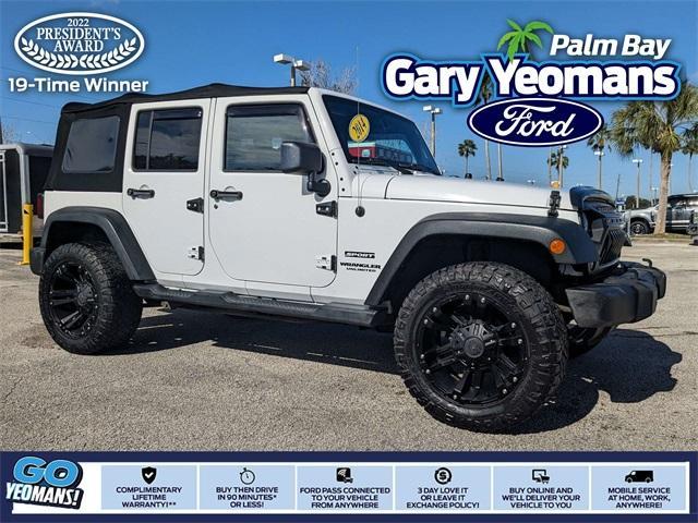 used 2014 Jeep Wrangler Unlimited car, priced at $14,399