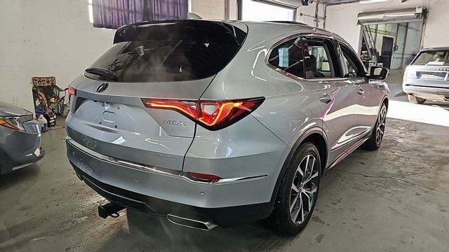 used 2022 Acura MDX car, priced at $37,000