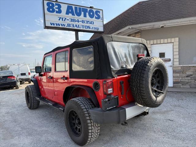 used 2015 Jeep Wrangler Unlimited car, priced at $18,987