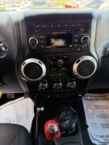 used 2015 Jeep Wrangler Unlimited car, priced at $18,987