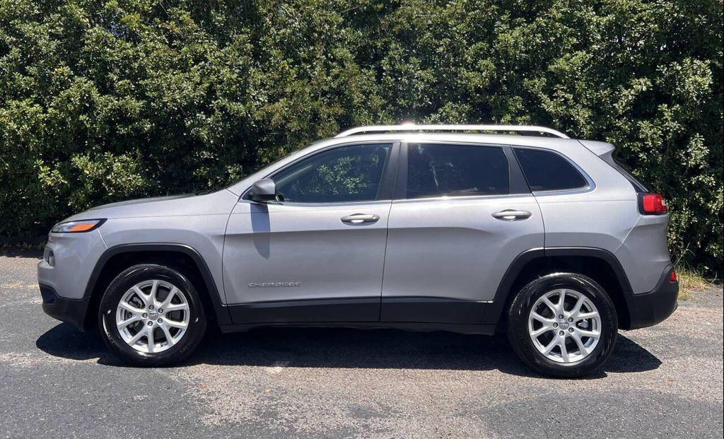 used 2014 Jeep Cherokee car, priced at $7,999
