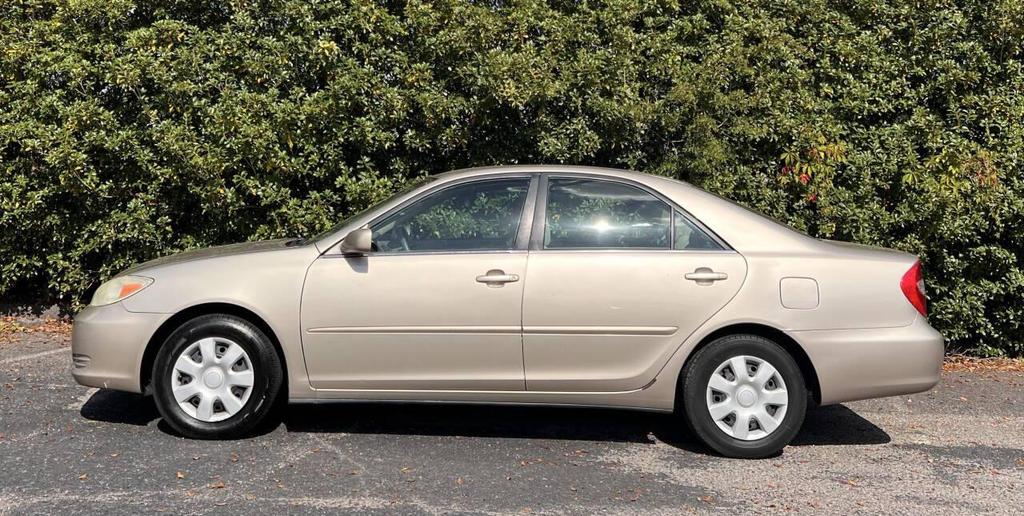 used 2004 Toyota Camry car, priced at $6,999