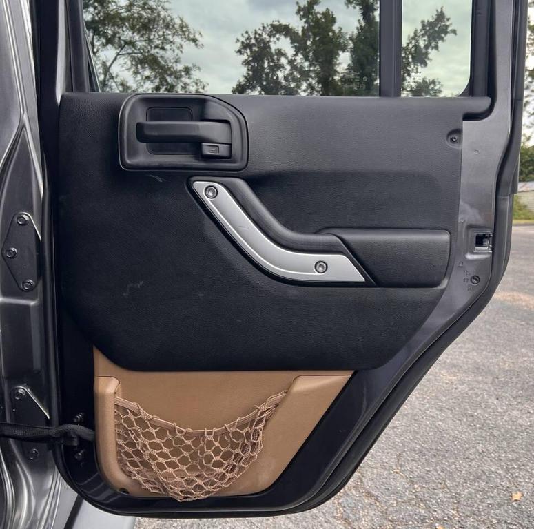 used 2016 Jeep Wrangler Unlimited car, priced at $16,900