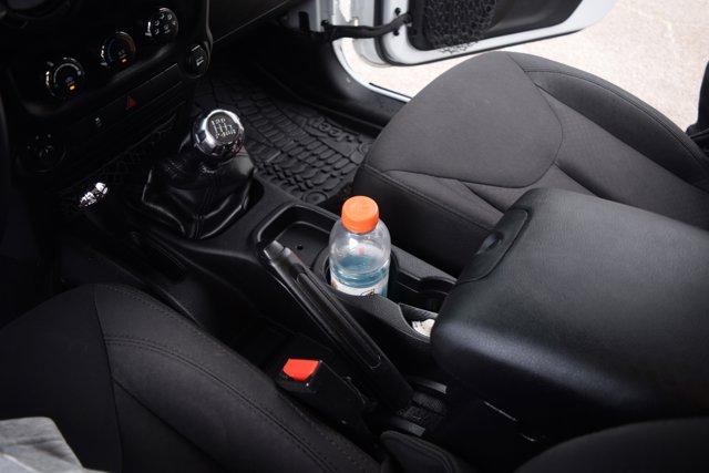used 2015 Jeep Wrangler car, priced at $17,000