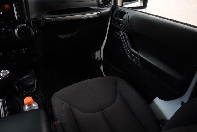 used 2015 Jeep Wrangler car, priced at $17,000