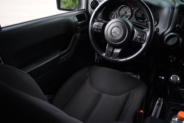 used 2015 Jeep Wrangler car, priced at $17,000