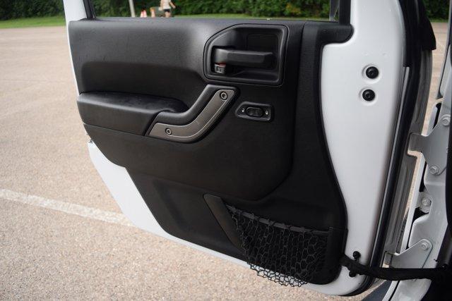 used 2015 Jeep Wrangler car, priced at $17,000