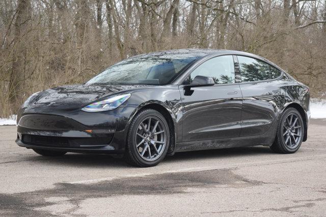 used 2022 Tesla Model 3 car, priced at $22,500