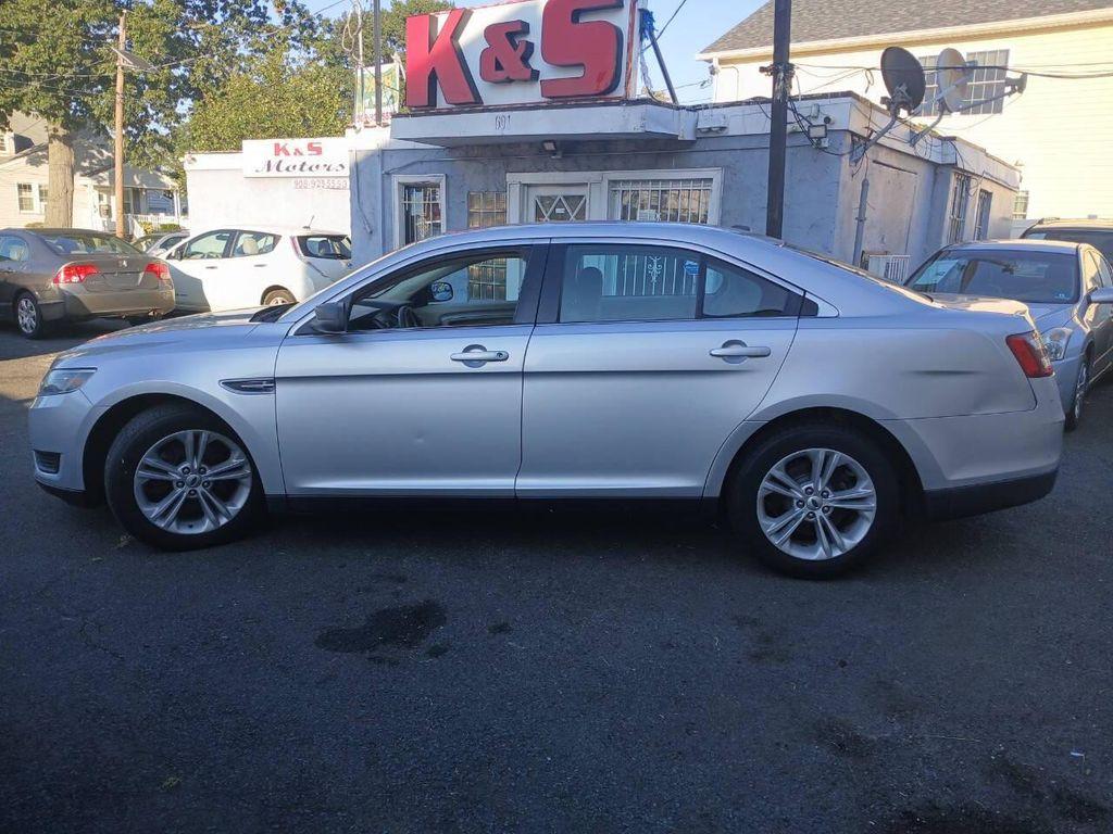 used 2015 Ford Taurus car, priced at $5,999