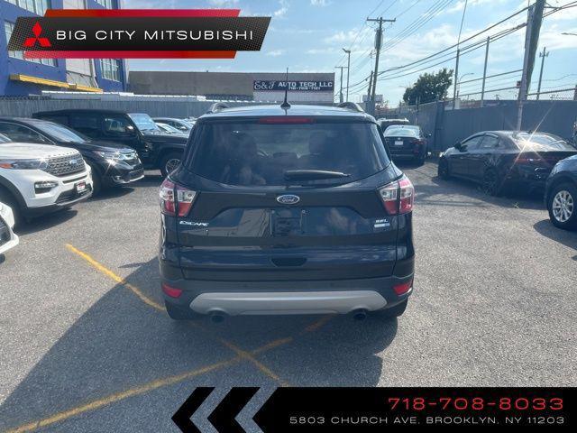 used 2018 Ford Escape car, priced at $13,690