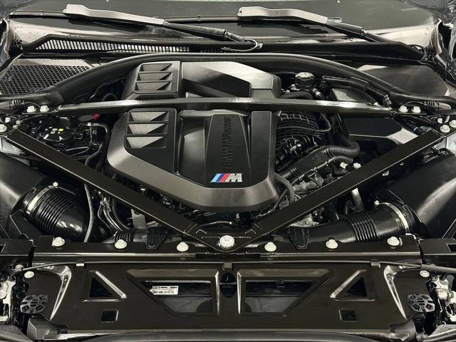 used 2023 BMW M4 car, priced at $74,800