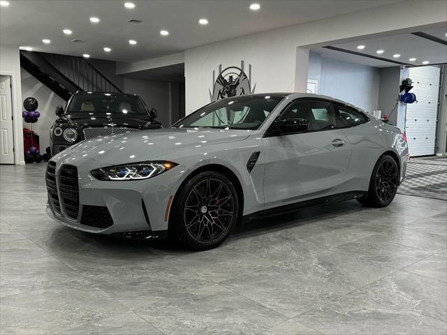 used 2023 BMW M4 car, priced at $74,800