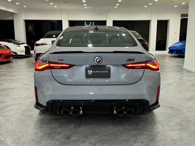 used 2023 BMW M4 car, priced at $74,800