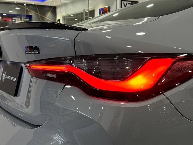 used 2023 BMW M4 car, priced at $74,800