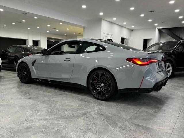 used 2023 BMW M4 car, priced at $74,800