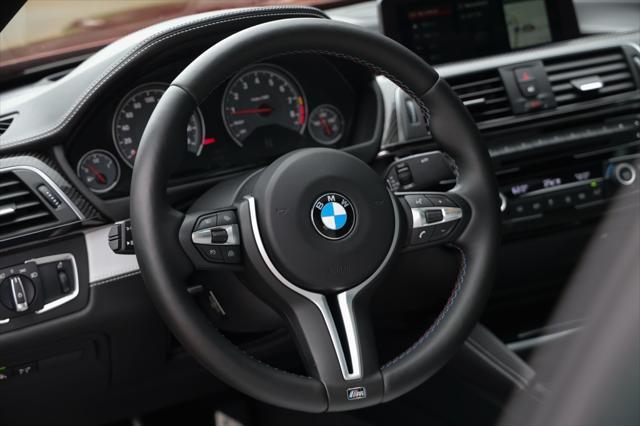 used 2018 BMW M4 car, priced at $54,000