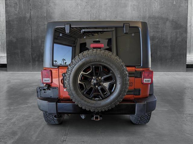 used 2014 Jeep Wrangler Unlimited car, priced at $17,991