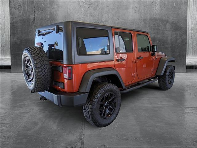 used 2014 Jeep Wrangler Unlimited car, priced at $17,991