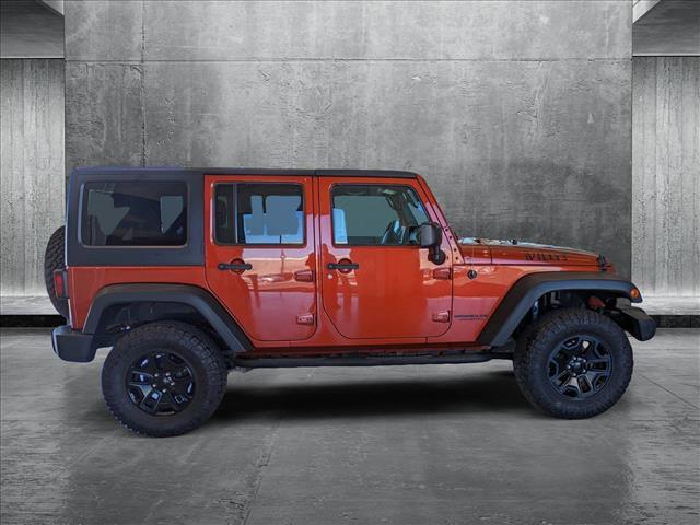 used 2014 Jeep Wrangler Unlimited car, priced at $17,991