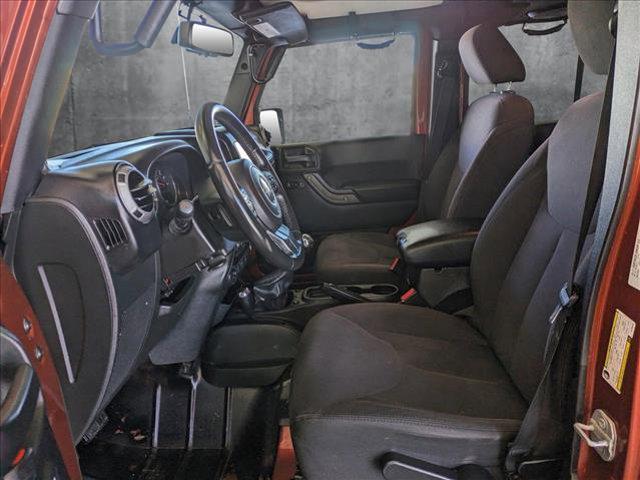 used 2014 Jeep Wrangler Unlimited car, priced at $17,991