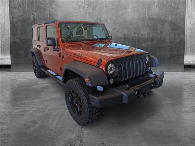 used 2014 Jeep Wrangler Unlimited car, priced at $17,991