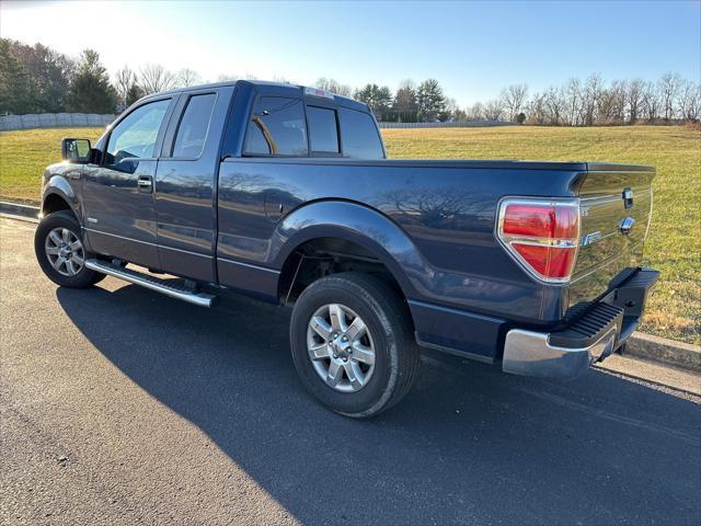 used 2013 Ford F-150 car, priced at $14,000