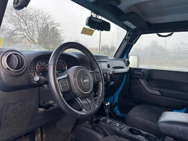 used 2018 Jeep Wrangler JK Unlimited car, priced at $18,000