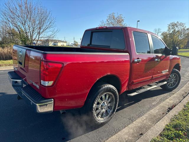 used 2010 Nissan Titan car, priced at $14,000