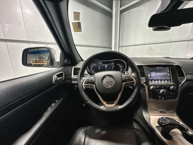 used 2014 Jeep Grand Cherokee car, priced at $15,499