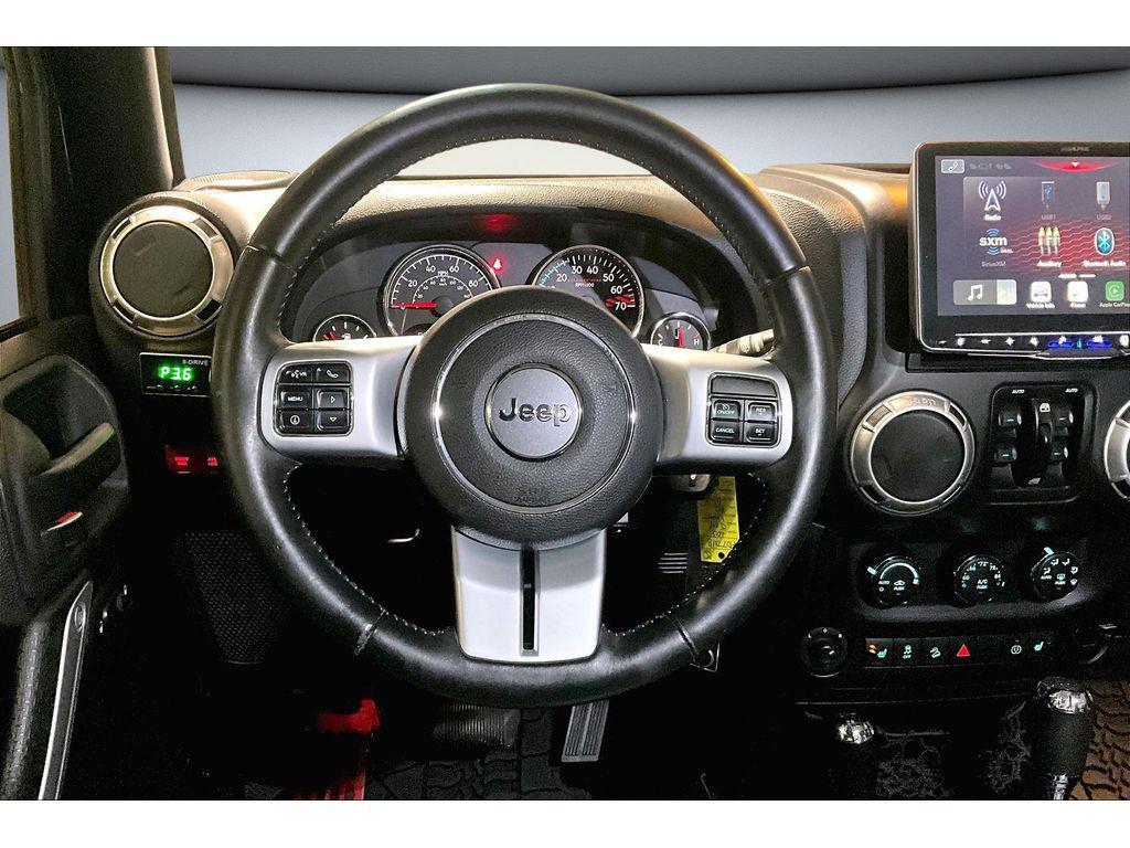 used 2015 Jeep Wrangler Unlimited car, priced at $19,299