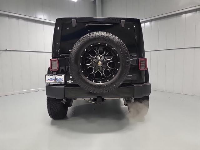 used 2018 Jeep Wrangler JK Unlimited car, priced at $23,856