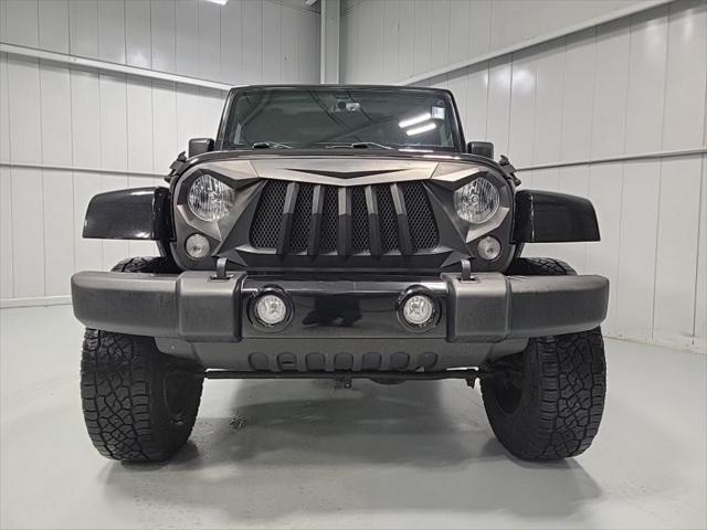 used 2018 Jeep Wrangler JK Unlimited car, priced at $23,856