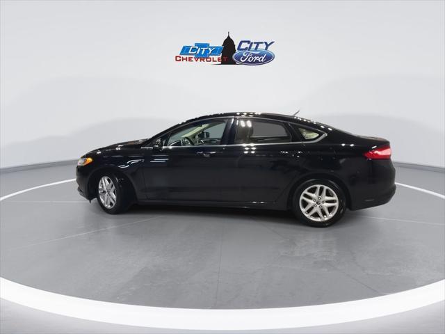 used 2016 Ford Fusion car, priced at $12,399