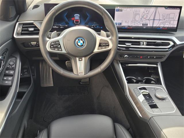 used 2024 BMW 330e car, priced at $36,990