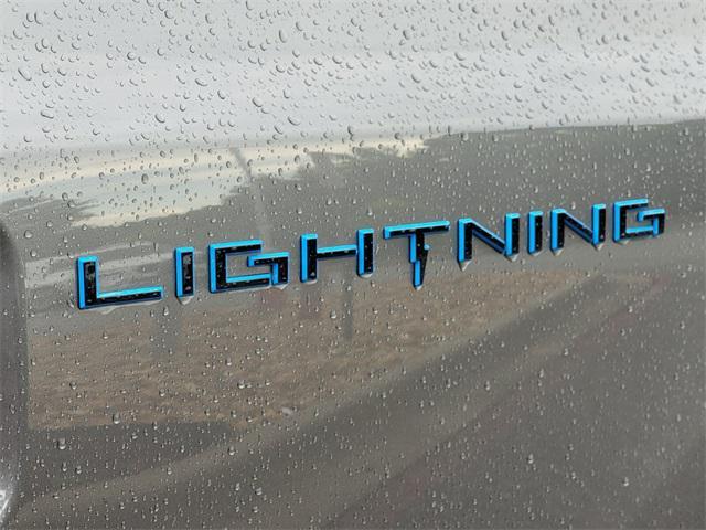 used 2022 Ford F-150 Lightning car, priced at $48,990