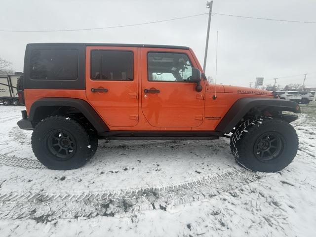 used 2015 Jeep Wrangler Unlimited car, priced at $24,383