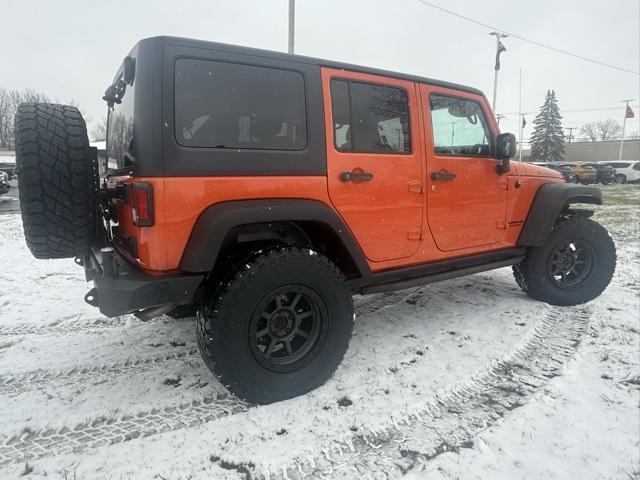 used 2015 Jeep Wrangler Unlimited car, priced at $24,383