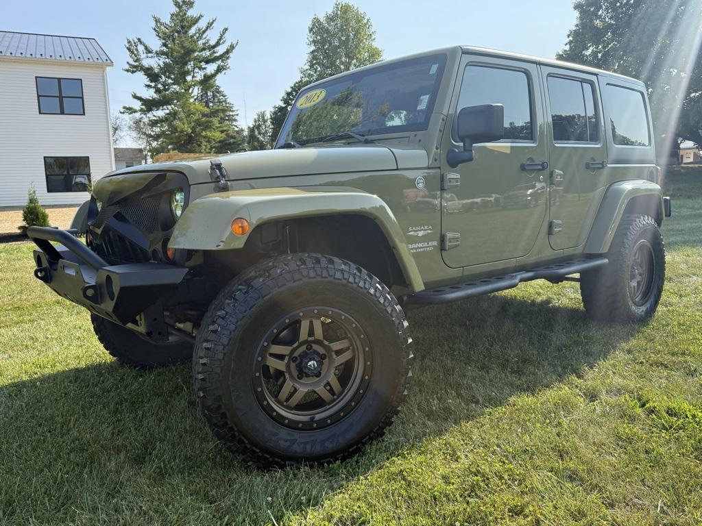 used 2013 Jeep Wrangler Unlimited car, priced at $13,852