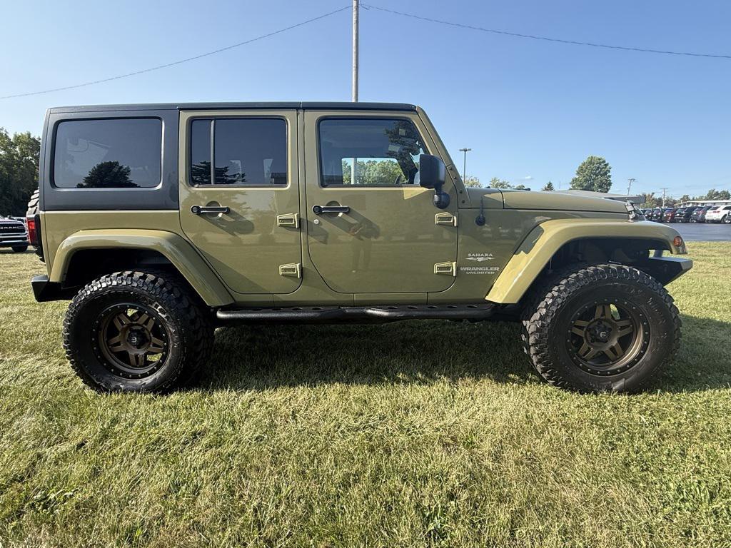 used 2013 Jeep Wrangler Unlimited car, priced at $13,852