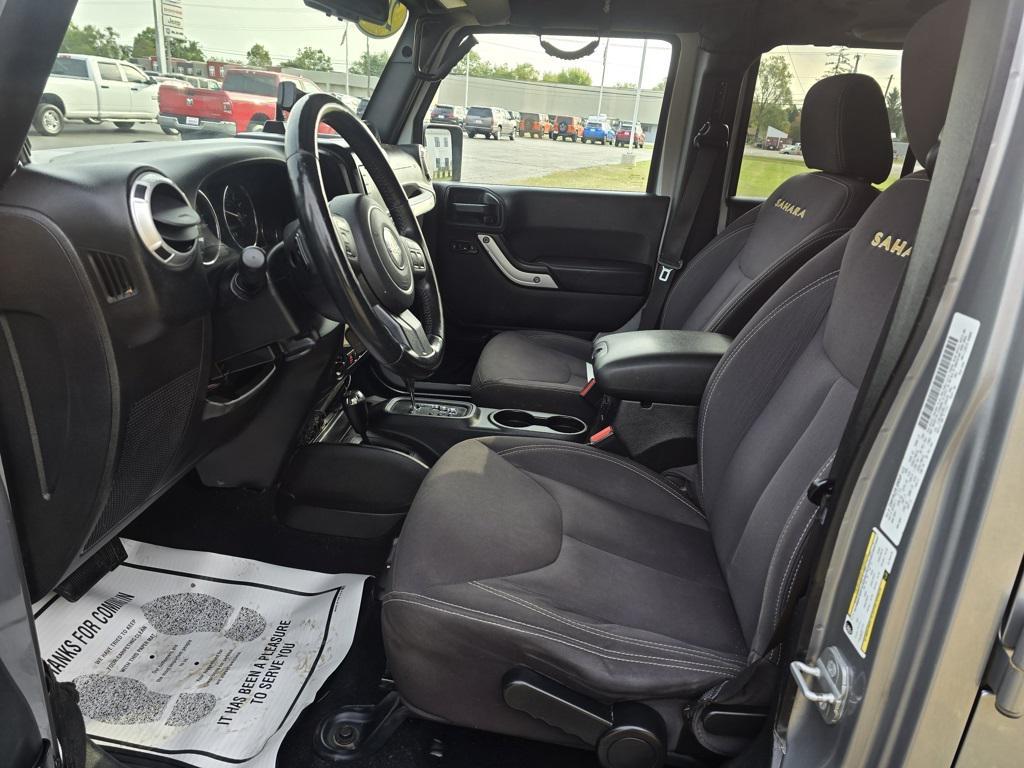 used 2014 Jeep Wrangler Unlimited car, priced at $15,579