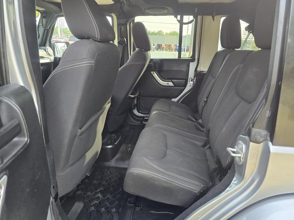 used 2014 Jeep Wrangler Unlimited car, priced at $15,579