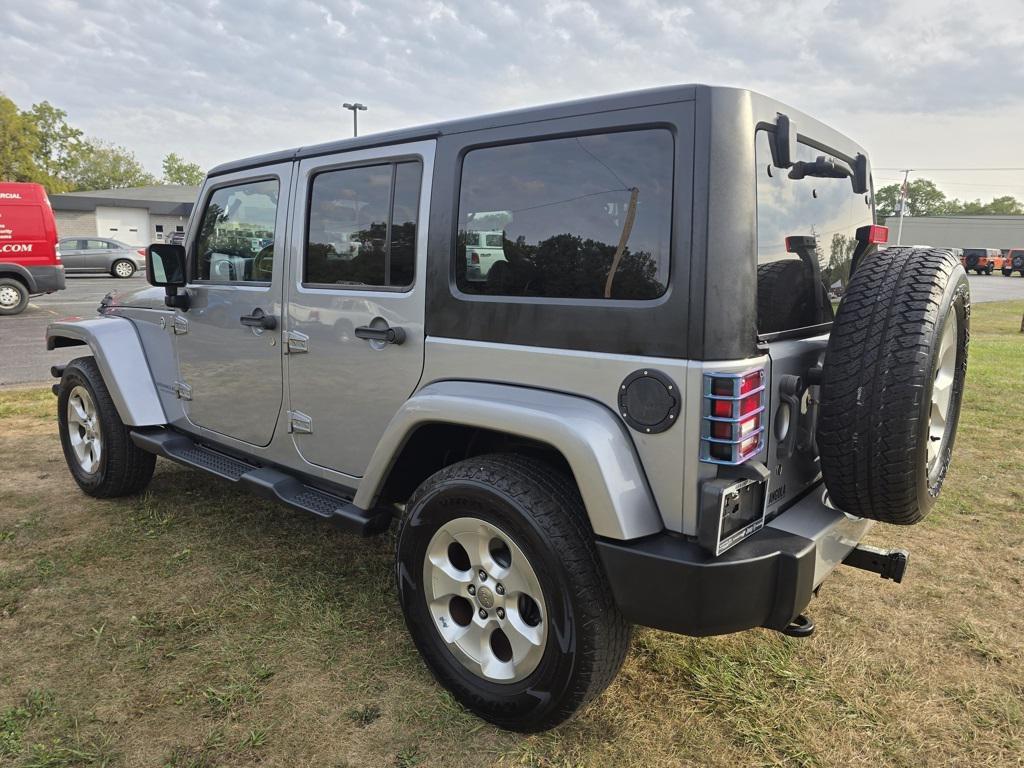 used 2014 Jeep Wrangler Unlimited car, priced at $15,579