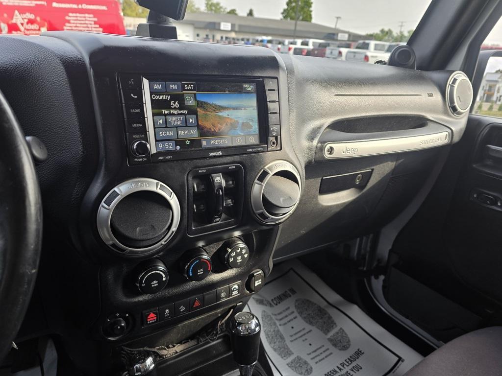 used 2014 Jeep Wrangler Unlimited car, priced at $15,579