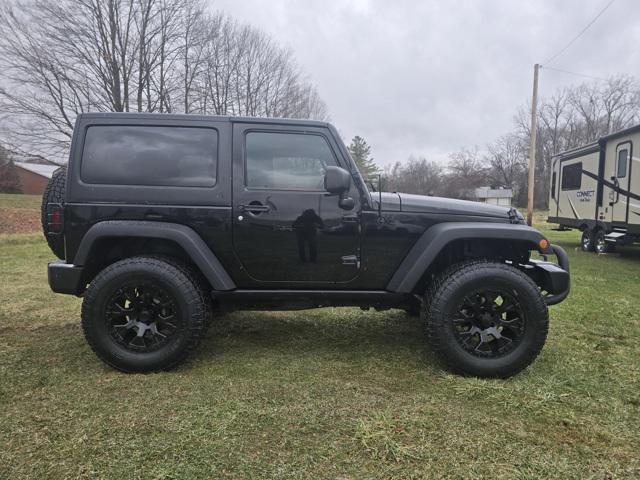 used 2015 Jeep Wrangler car, priced at $21,521