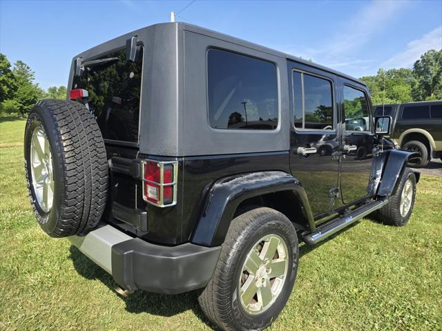 used 2009 Jeep Wrangler Unlimited car, priced at $14,924