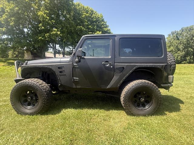 used 2014 Jeep Wrangler car, priced at $16,597