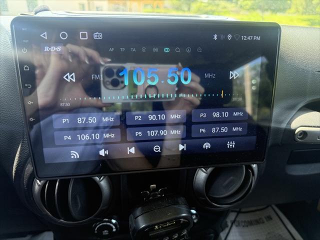 used 2014 Jeep Wrangler car, priced at $16,597